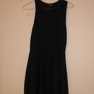 Thigh length black dress